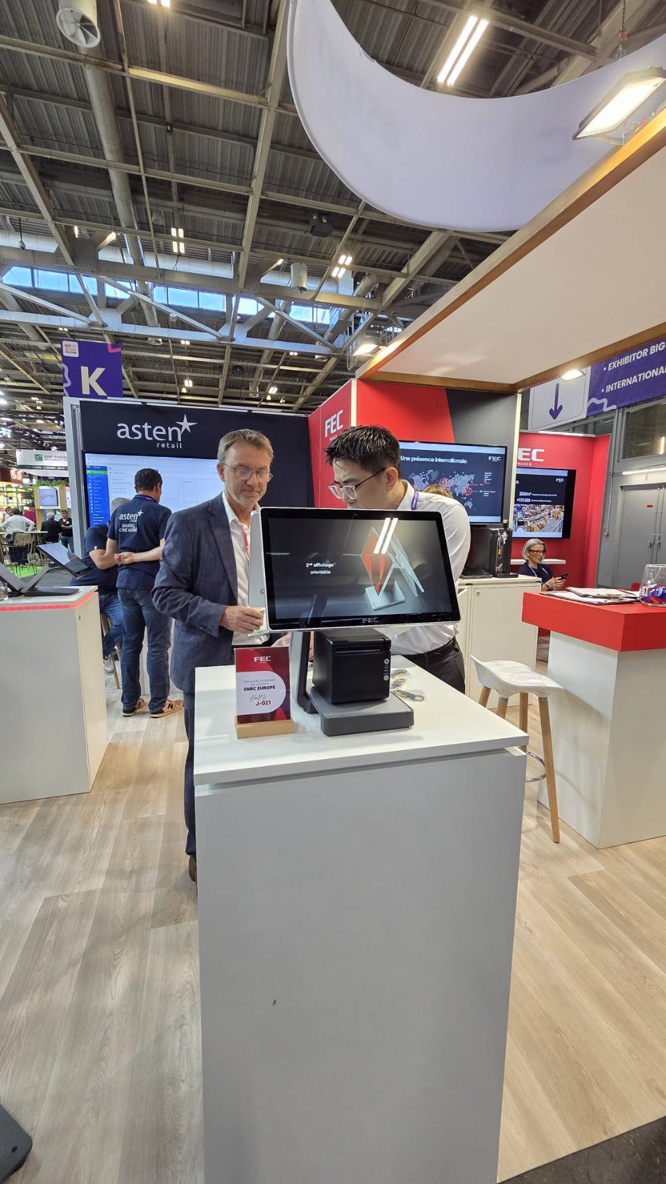 Visitors trying the new FEC U-POS terminal with its adjustable second display